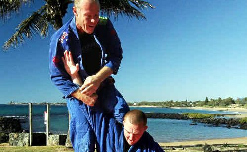Andrew Humphrey cops a flying arm bar from one of his students. Andrew Humphrey cops a flying arm bar from one of his students.